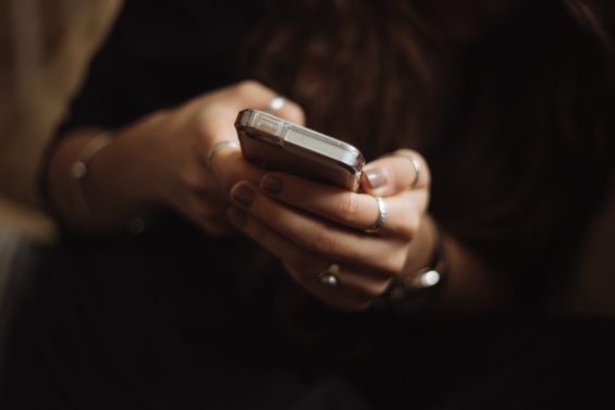 closeup of woman's hands holding a mobile phone